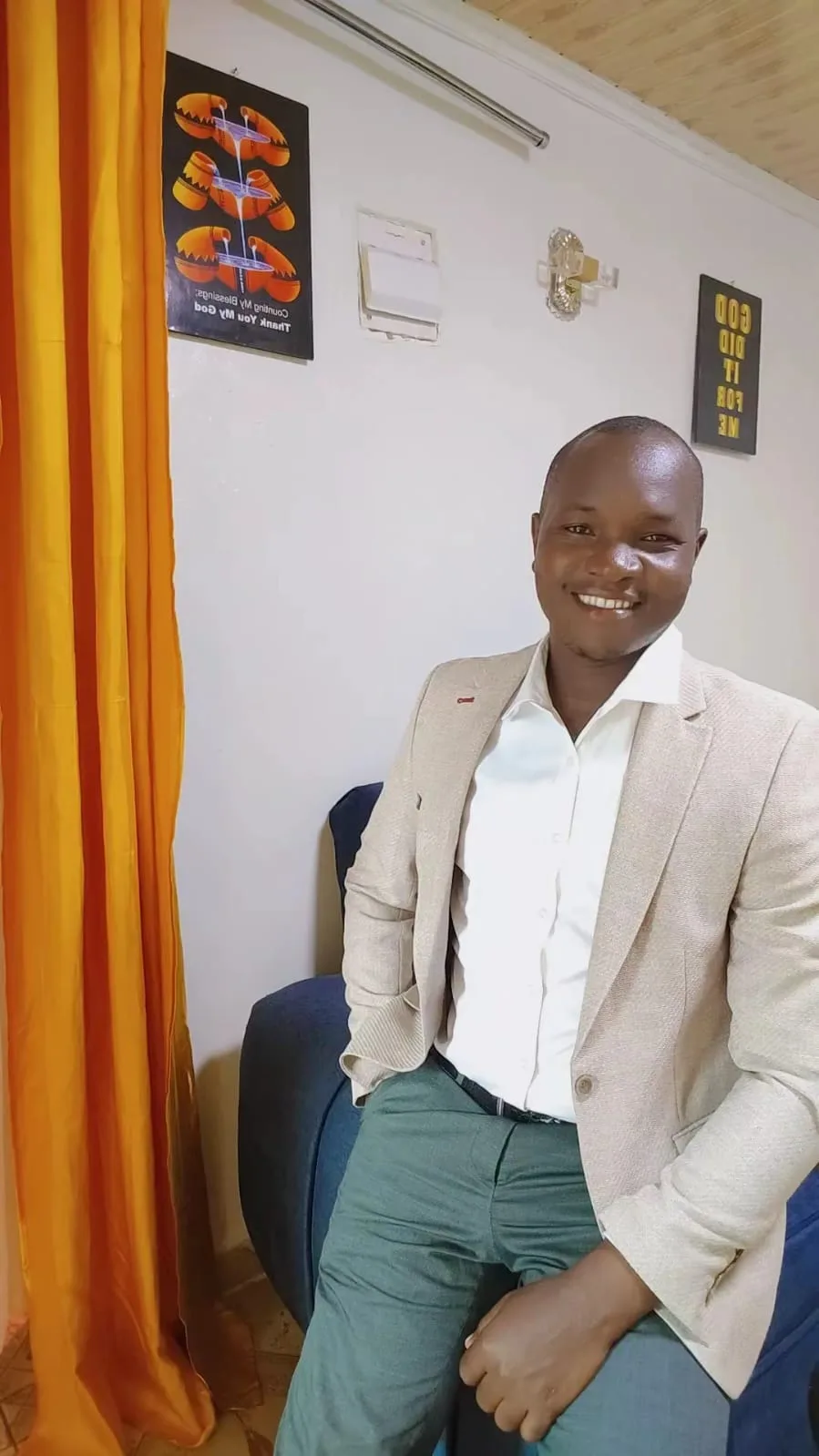A Restoration community leader seated indoors