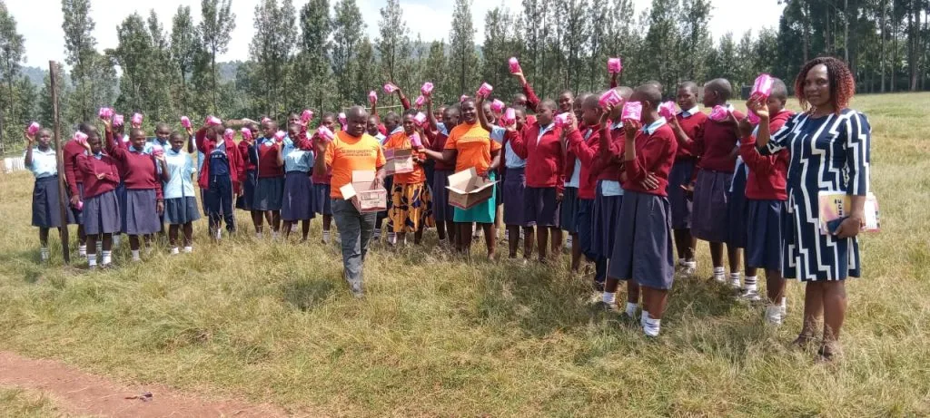 Children standing together outdoors during a Restoration community celebration